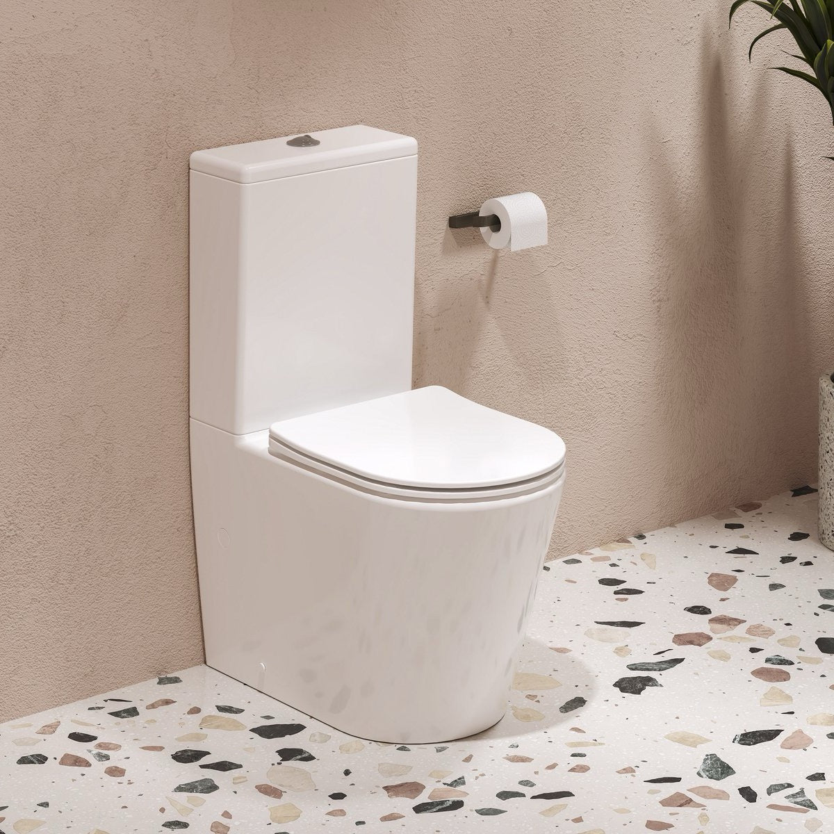 X01872 Ravak Elegant talna brezrobna WC školjka monoblok z WC desko s počasnim zapiranjem