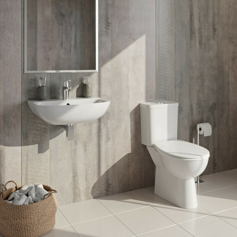 WC školjke 39347000 Grohe Bau Ceramic talna WC školjka monoblok (stenski izliv) z WC desko s počasnim zapiranjem | KOPALNICA-ONLINE.SI